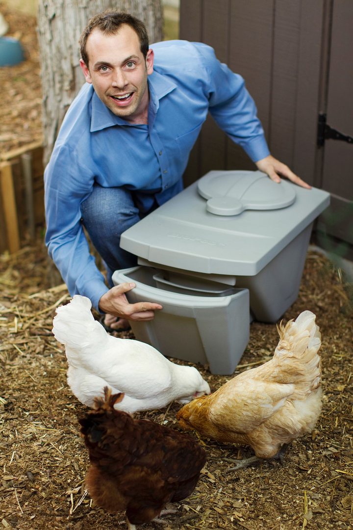 Robert L. Olivier with chickens and BioPod